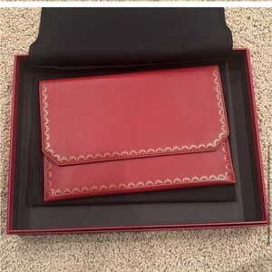 CARTIER Elegant Red Clutch with Gold Accents
Cartier Guirlande